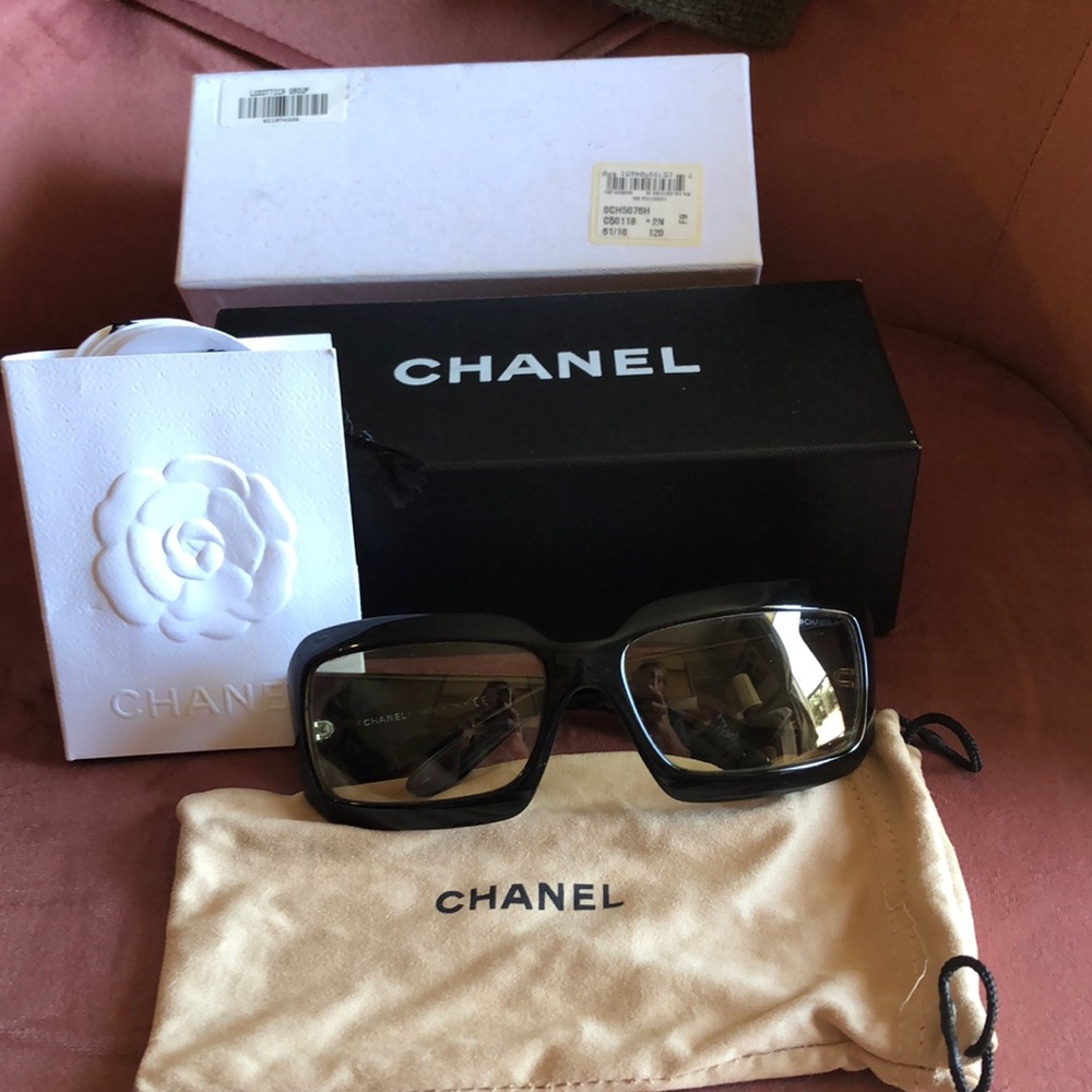 Chanel sunglasses, mother of pearl logo on sides.